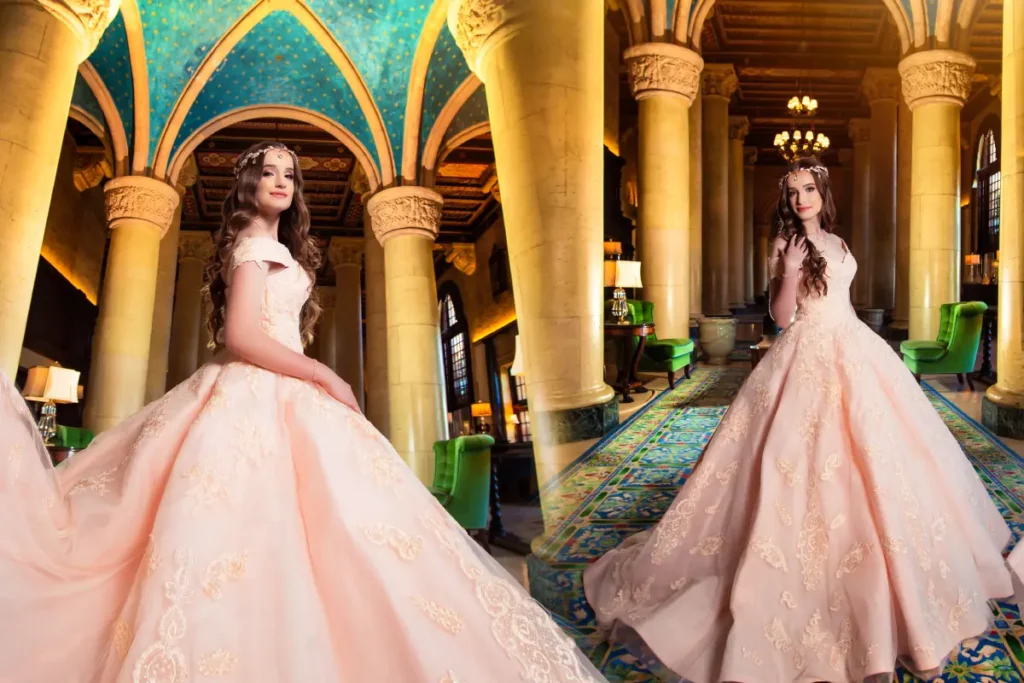 Castle quinceanera shoot at The Biltmore Hotel: peach ball gown among grand columns and a teal vaulted ceiling.